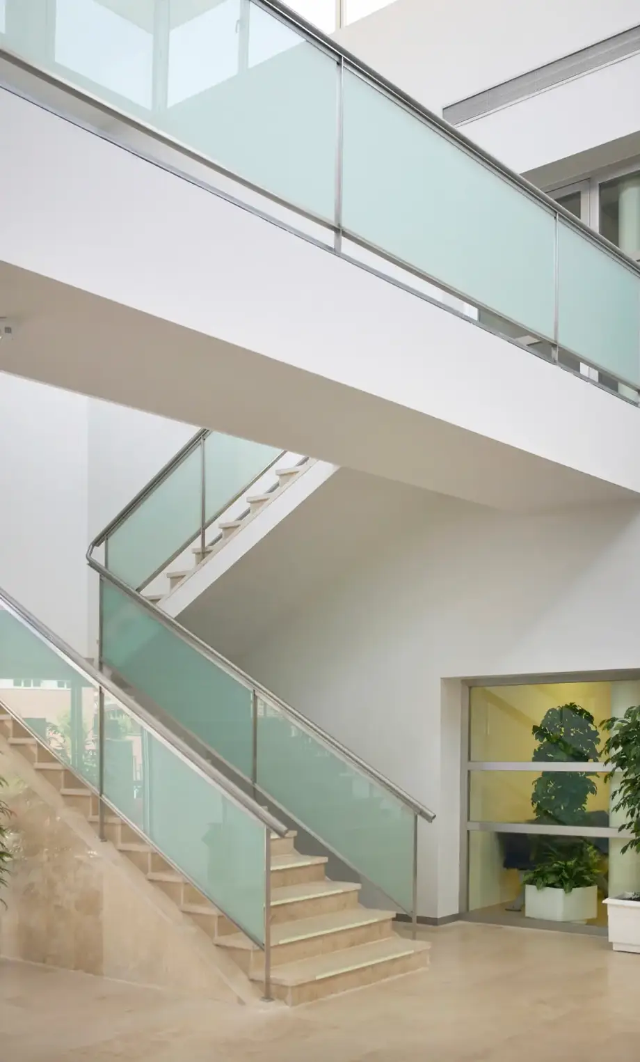 Modern building interior with staircase and walkway. Architecture and construction